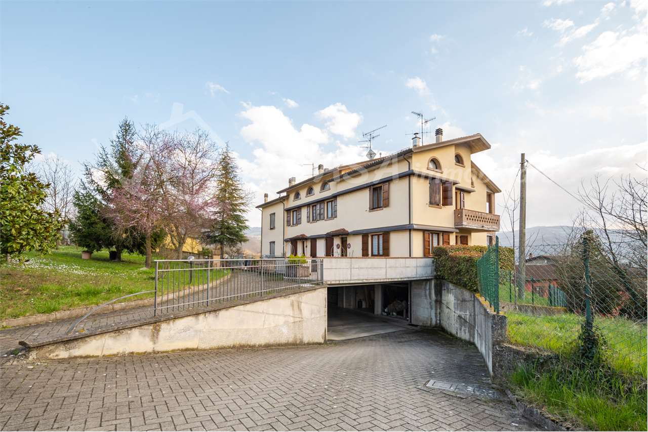 Villetta a schiera immersa nel verde