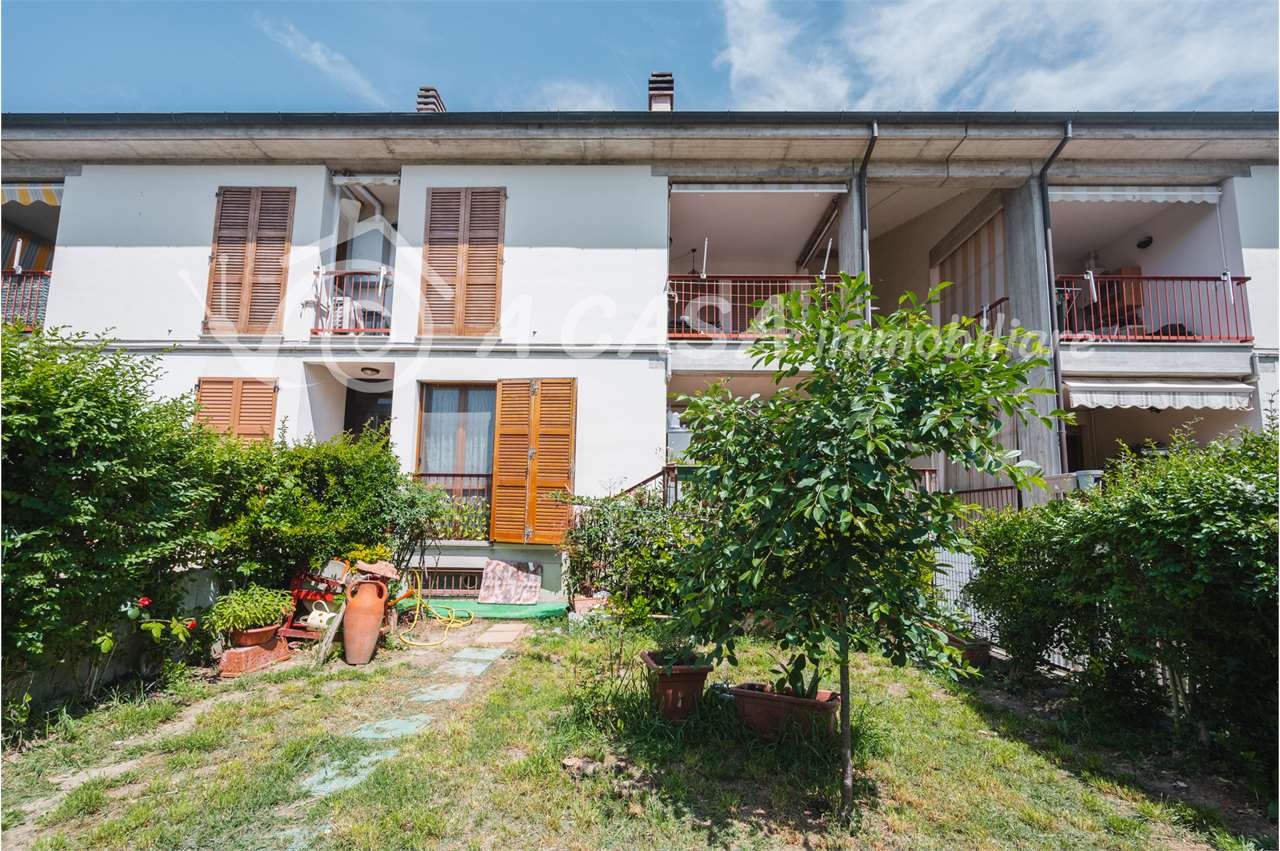 TRILOCALE CON GIARDINO E TERRAZZO